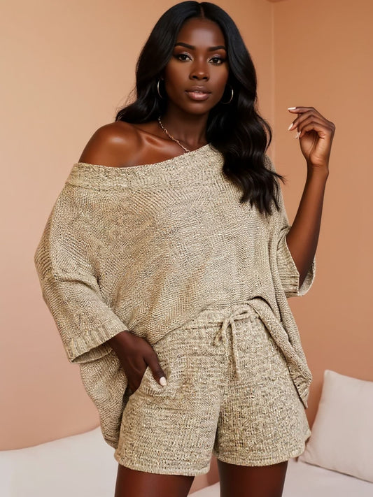 Woman wearing a beige off-shoulder top and shorts set against a beige background