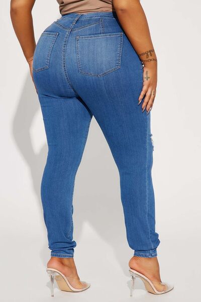 Medium Distressed Buttoned Jeans with Pockets