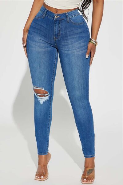 Medium Distressed Buttoned Jeans with Pockets