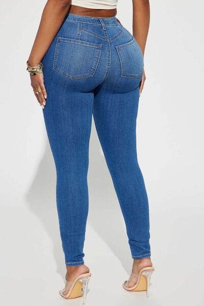 Medium Distressed Buttoned Jeans with Pockets